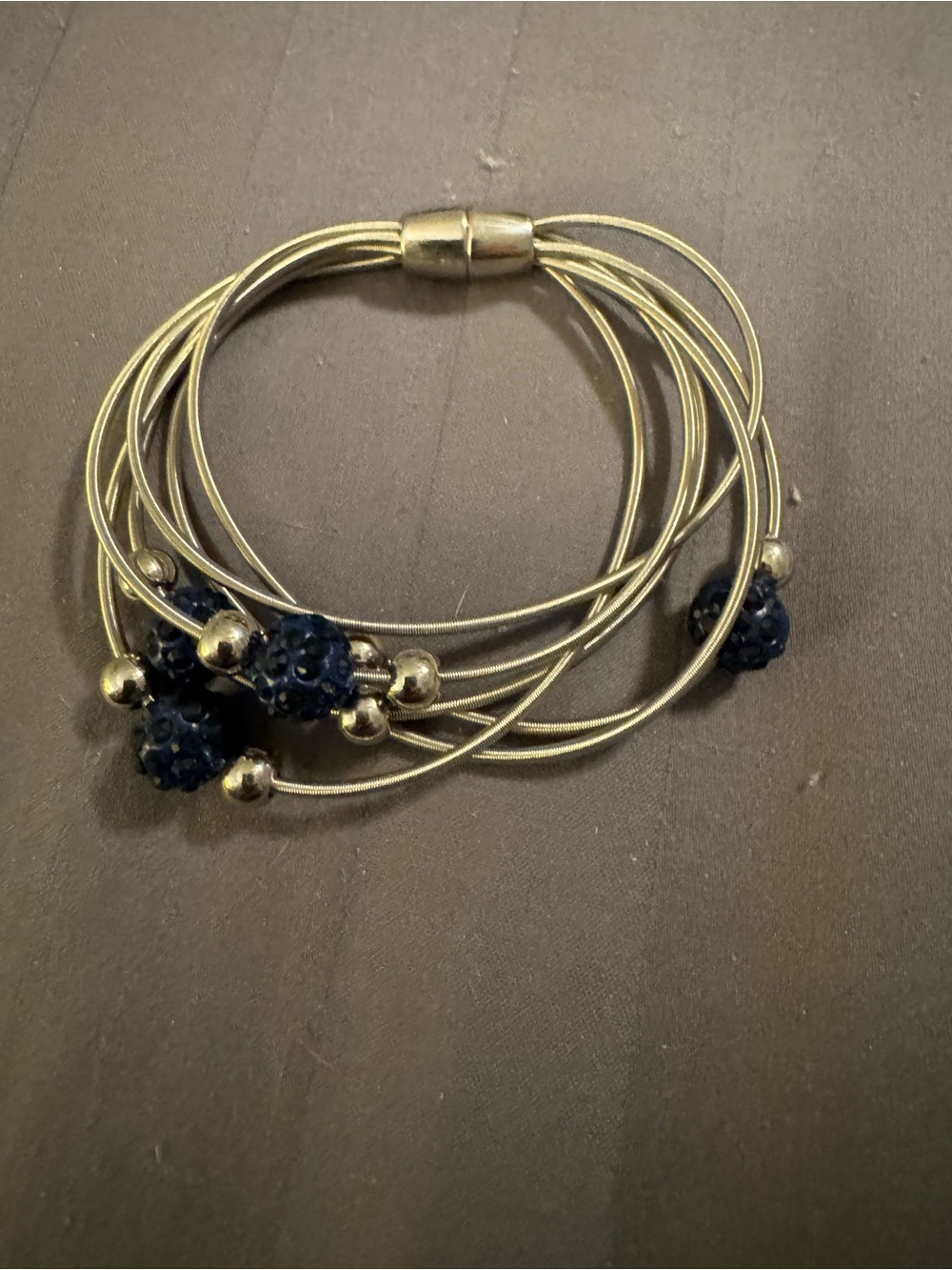 Multi-Strand Silver Tone Bracelet with Navy & Silver Bead & magnetic clasp.